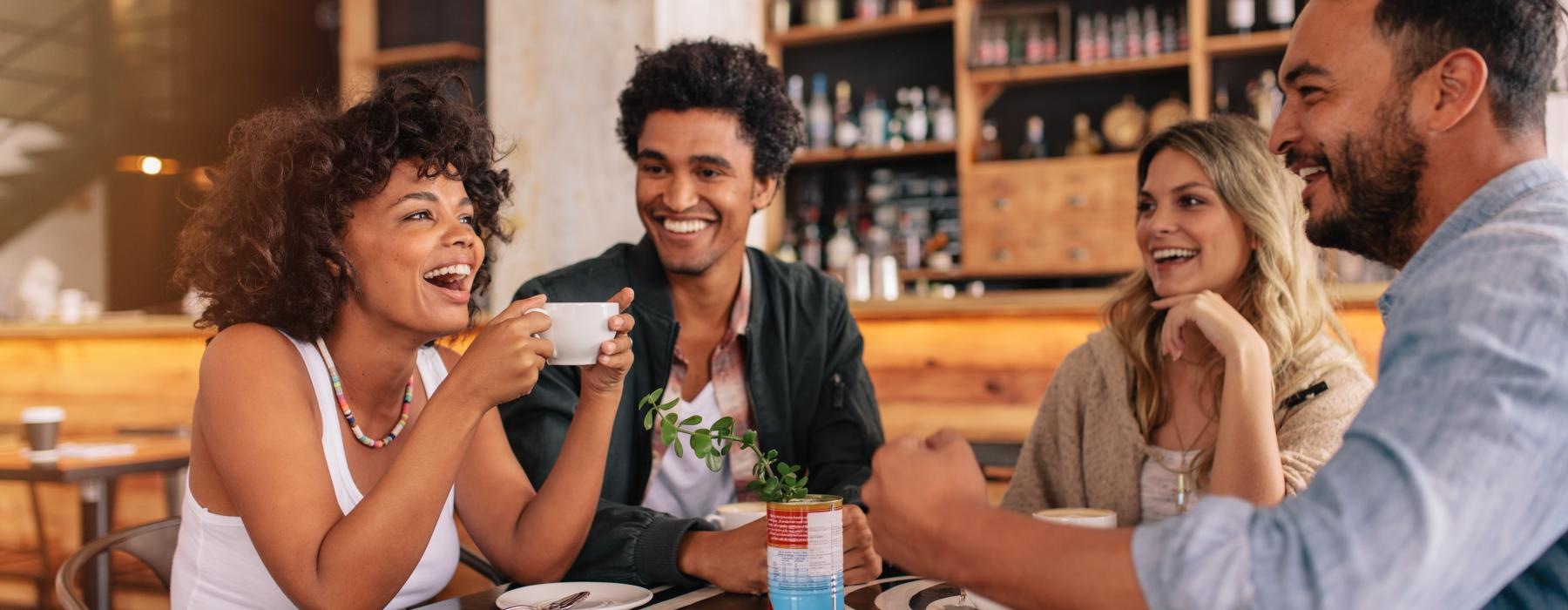 a group of people sitting at a table