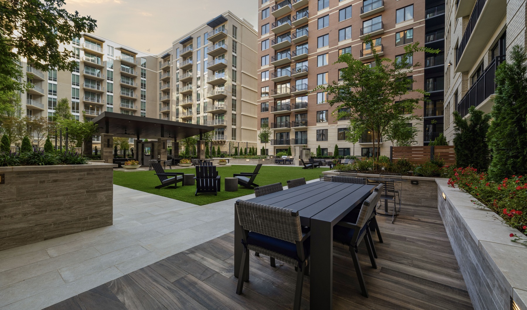 4th Floor Courtyard 4th level courtyard with open green space, variety of seating, and grills