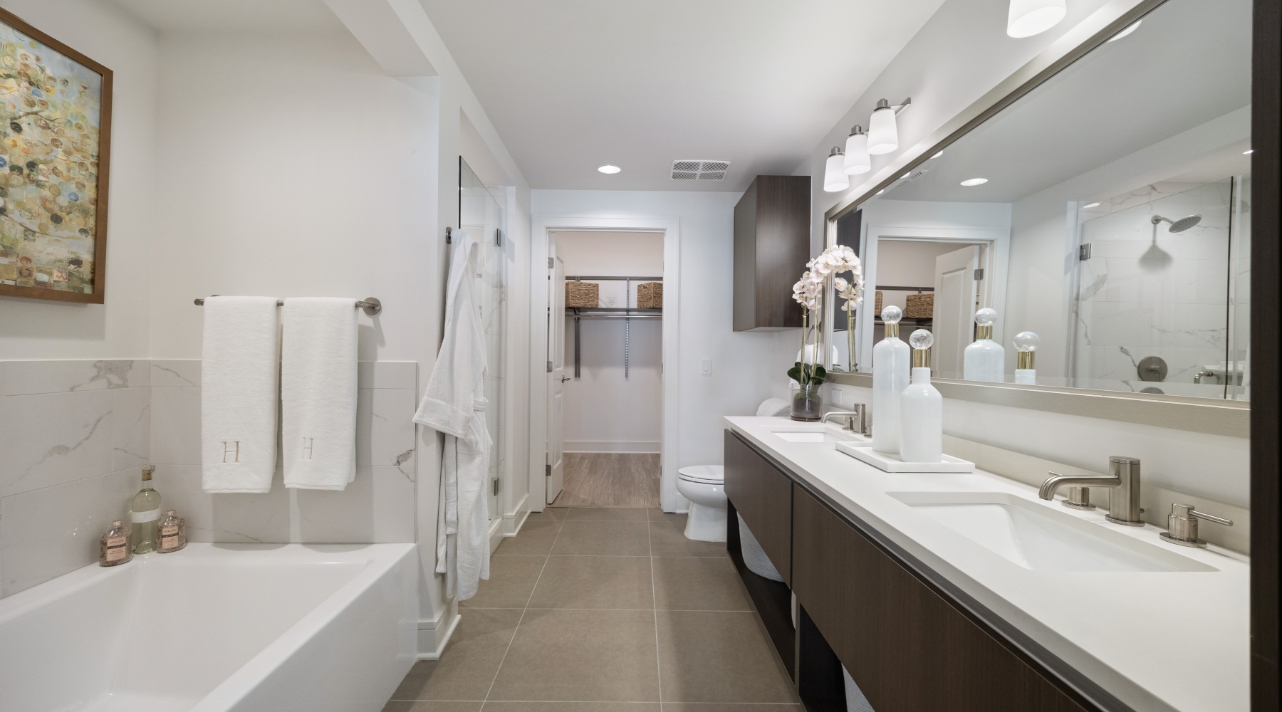 Bathroom options with thoughtful details a bathroom with a tub sink and mirror