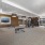 large work out area with free weights, two work out benches and cardio equipment 