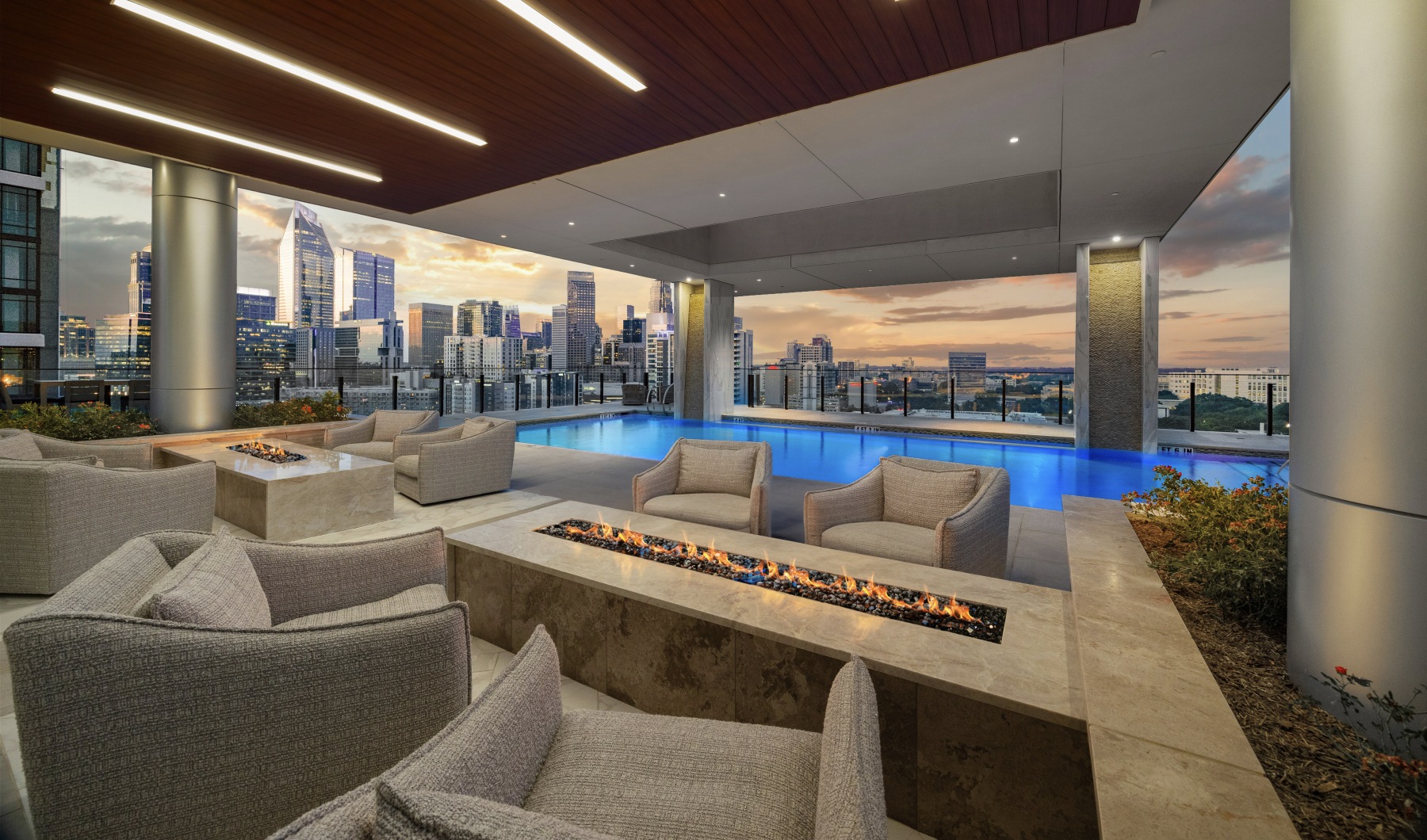 rooftop pool deck with 2 fire pits and a view of uptown Charolotte 