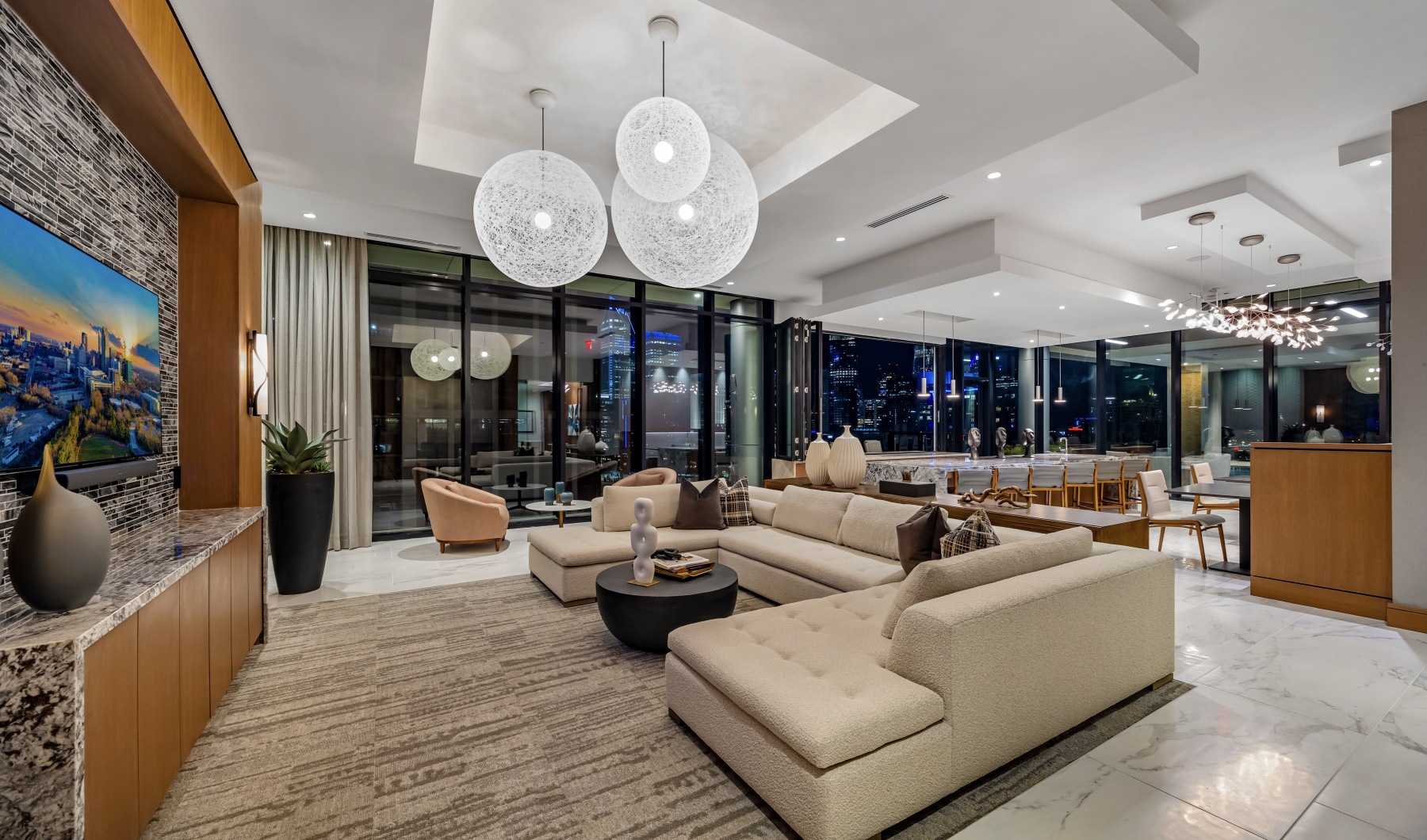 Clubroom  clubroom photo with couch and dinning table seating, entertaining kitchen, and tv